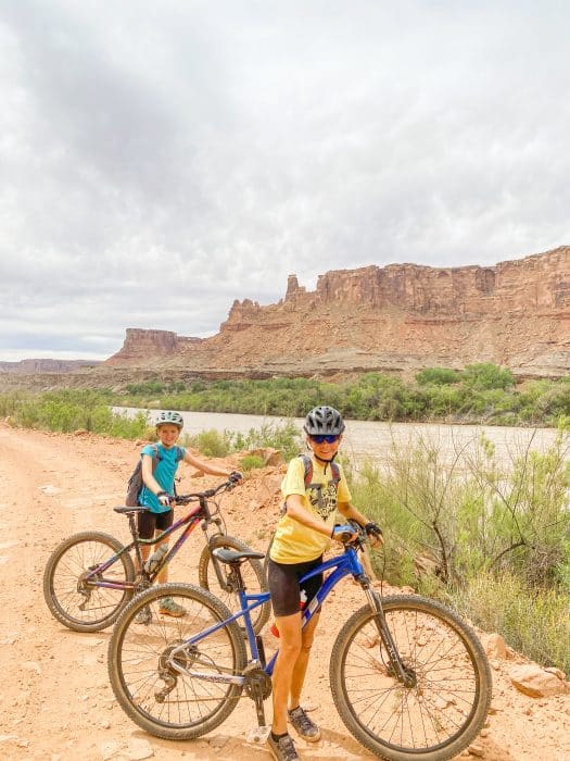 biking next to the green river canyonlands national park